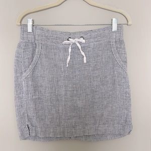 Athleta navy and white pinstriped miniskirt